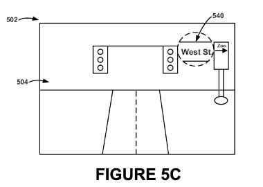 A screenshot from the patent application showing part of a street sign zoomed in upon after a triggering gesture.